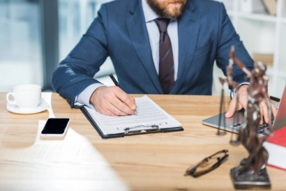 Concerned professional in NYC navigating ERISA and state benefit laws
