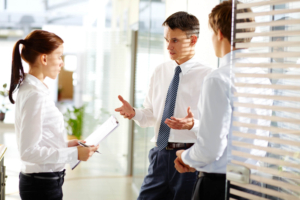 Office scene showing HR professional in New Jersey navigating ERISA compliance
